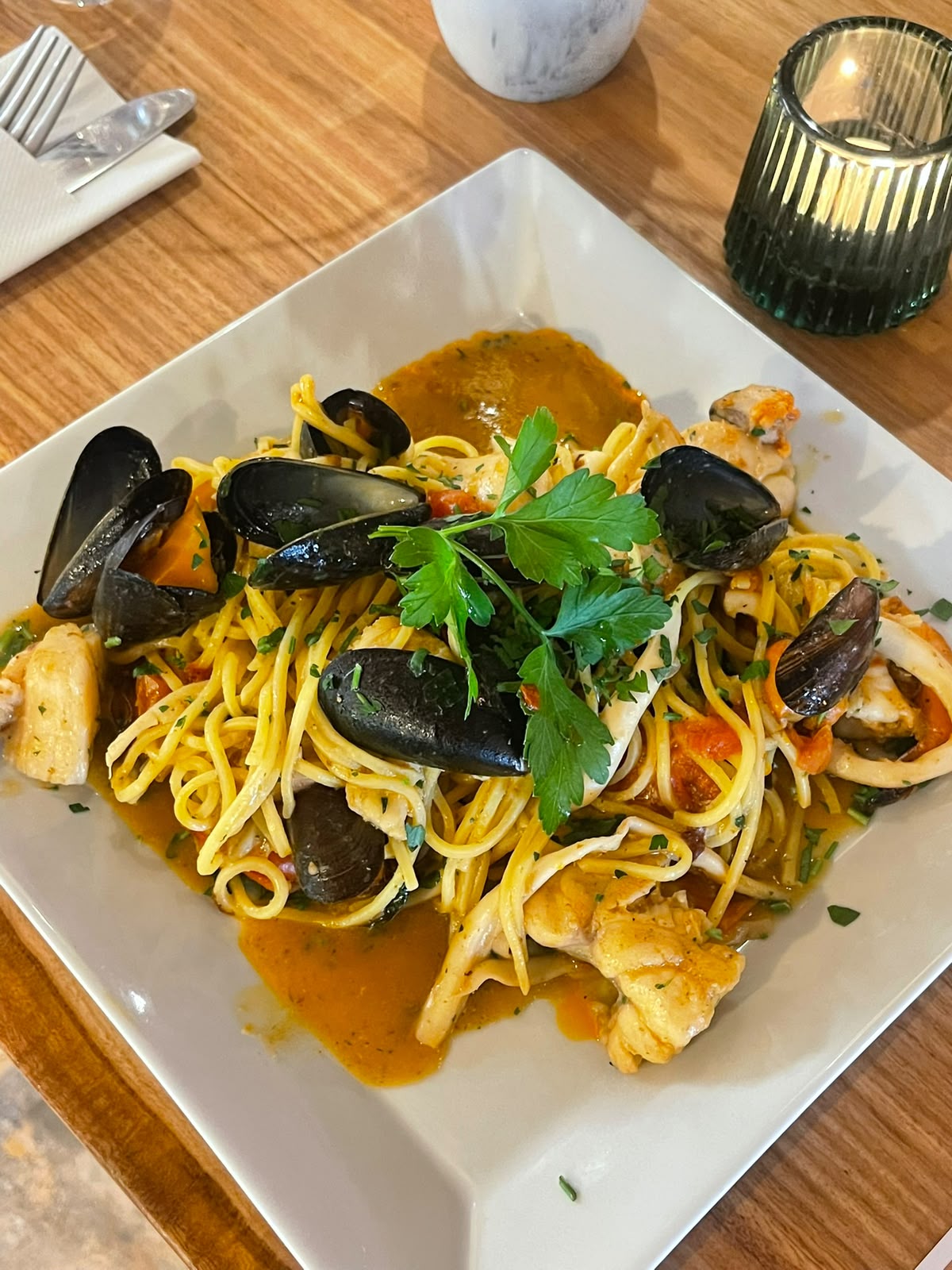 Tagliolini Gambas, prawns and shellfish in a garlic-infused tomato sauce